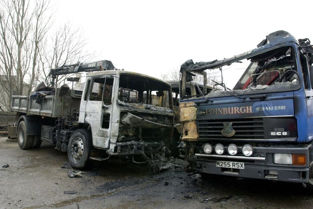 Burnt-out lorries at Andersons Yard at Longstone Road after a fire broke out in the early hours of the morning in 2001.