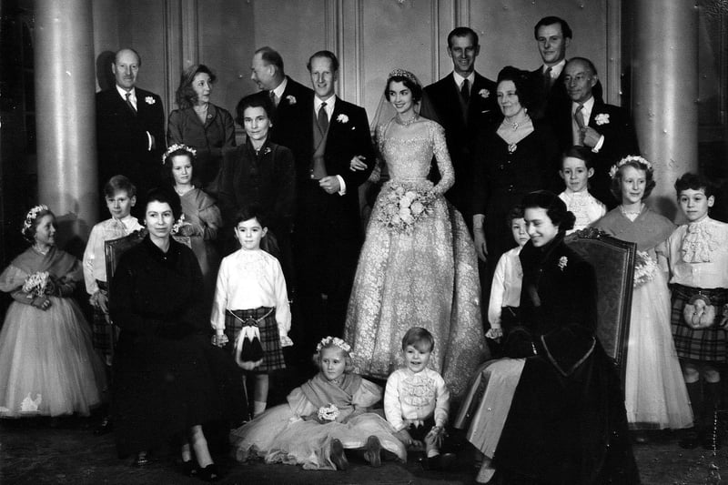 Evening News readers were the first to see this picture of Royalty taken at a Dalkeith wedding, January 10 1953. The Queen (front left) and Princess Margaret (front right) are seated in front of the group, while standing behind (left to right) are the Duke of Buccleuch, Mrs McNeill, the Duchess of Gloucester, the Duke of Gloucester, the Earl of Dalkeith and his bride, the Duke of Edinburgh, the Duchess of Buccleuch, the best man Mr John Synge, and Mr John McNeill, Q.C.