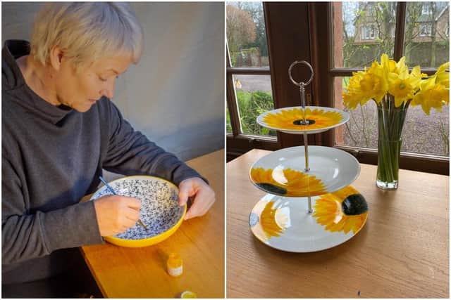 Susan Cameron painting a bowl and an example of one of her most popular buys at Echo Beach picture: Susan Cameron