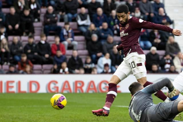 Josh Ginnelly scores Hearts' second goal of the game. Picture: SNS