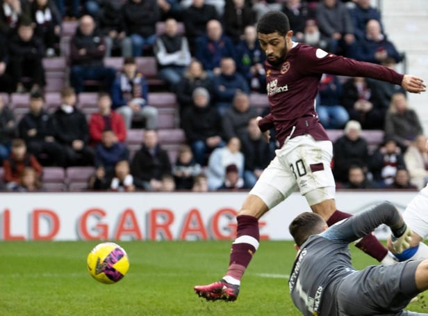 Josh Ginnelly scores Hearts' second goal of the game. Picture: SNS