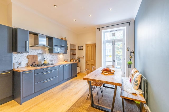 The kitchen/diner has french doors leading to the rear, space for dining, and is fitted with a range of modern base and wall units with the double oven, hob, built-in microwave, fridge/freezer and dishwasher to remain.
