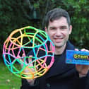 Mr Lind hails StemZ marking its fifth anniversary by donating some of the toys to RNIB and The Donaldson Trust. Picture: contributed.