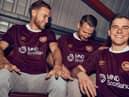 Hearts players Nathaniel Atkinson, Stephen Kingsley and Cammy Devlin model the new kit. Pic: Heart of Midlothian FC