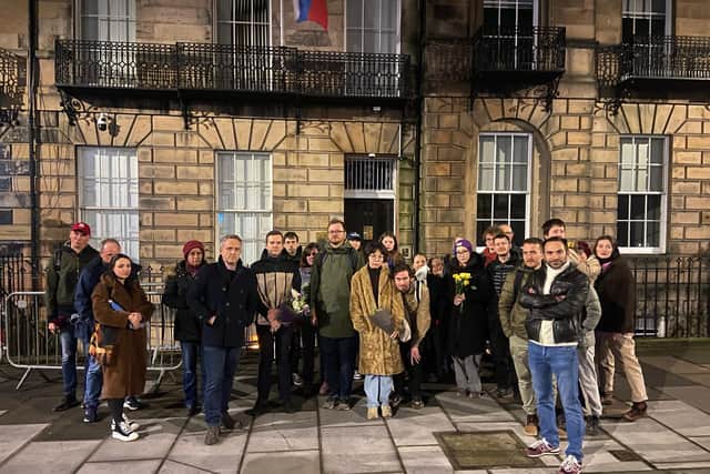 Some of the protestors at a gathering outside the Russian Consulate in Edinburgh on Friday night after the death in prison of opposition politician and anti-corruption campaigner Alexei Navalny