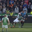 A freezeframe from Sky Sports' coverage of Rangers captain James Tavernier's challenge on Rocky Bushiri that led to shouts for a Hibs penalty
