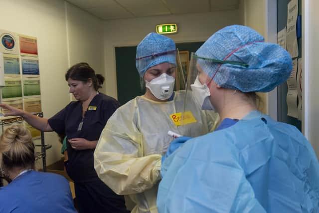 Staff inside Edinburgh Royal Infirmary wearing PPE picture: JPI Media
