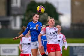 Jodi McLeary of Rangers and Ria McCafferty of Spartans contest a header. Credit: Malcolm Mackenzie