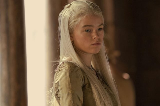 Princess Rhaenyra Targaryen, played by Milly Alcock and later Emma D'Arcy, is the firstborn child of King Viserys Targaryen with Queen Aemma Arryn. Nicknamed the 'Realm's Delight', Rhaenyra is declared heir to the Iron Throne by her father. But there are many in the realm who do not think a woman should rule.