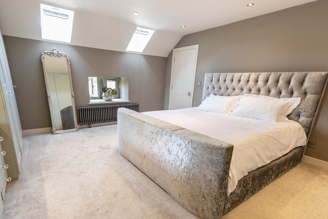 The main bedroom incorporates fitted storage and a complete four-piece bathroom suite.