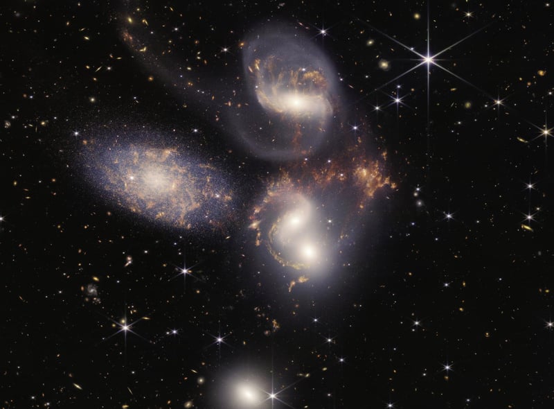 Another look at Stephan's Quintet captured by the James Webb Space Telescope. This image shows in rare detail how interacting galaxies trigger star formation in each other and how gas in galaxies is being disturbed. It also shows outflows driven by a black hole in Stephan’s Quintet in a level of detail never seen before.
