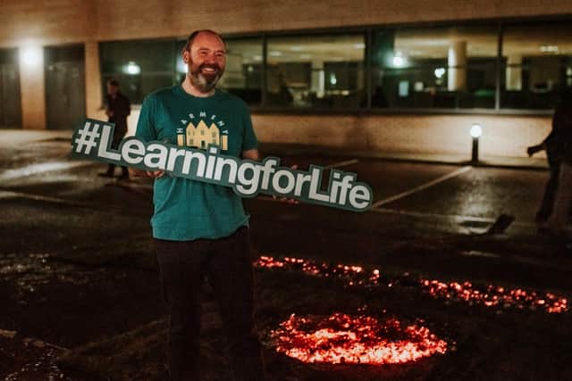 Leonardo's hardy fund-raisers proved their mettle - walking over hot coals to raise money for Harmeny