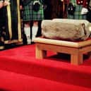 File photo of the Stone of Destiny, in the Great Hall in Edinburgh Castle. The Stone of Destiny will be moved from Edinburgh Castle to London for the coronation of the new King. Queen Elizabeth II's throne sat anove the stome when she was crowned in 1953 at Westminster Abbey. The historic artefact was returned to Scotland more than quarter of a century ago, but will be moved down to London for the ceremony.