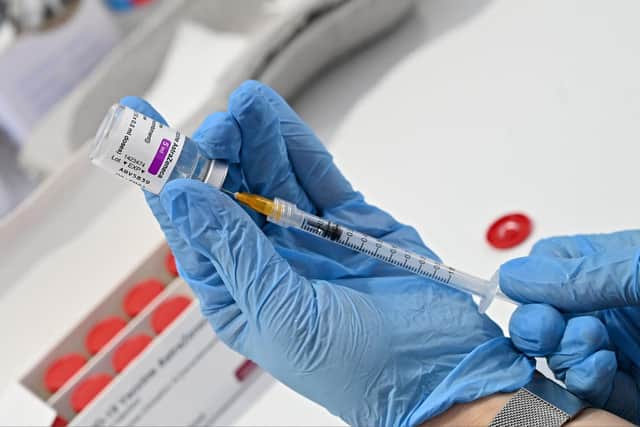 A syringe is prepared with Covid vaccine before someone gets their 'jag', or should that be 'jab'? (Picture: Andreas Solaro/AFP via Getty Images)