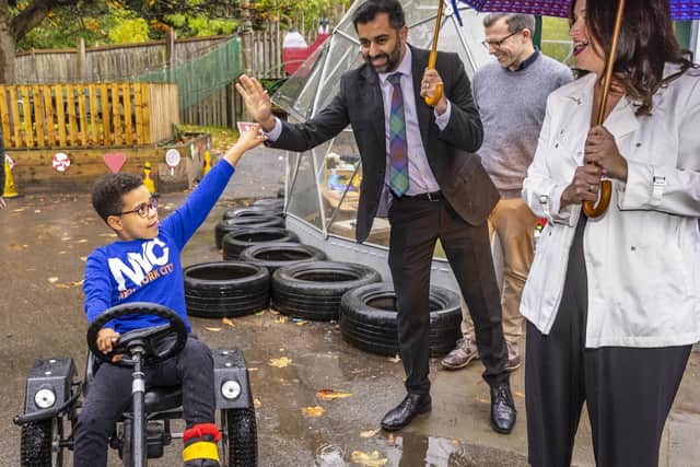 First Minister Humza Yousaf meets children and their families who benefit from services at The Yard in Edinburgh as chief executive Celine Sinclair shows him the adventure play facilities offered by the centre.  Picture: Andrew Barr.