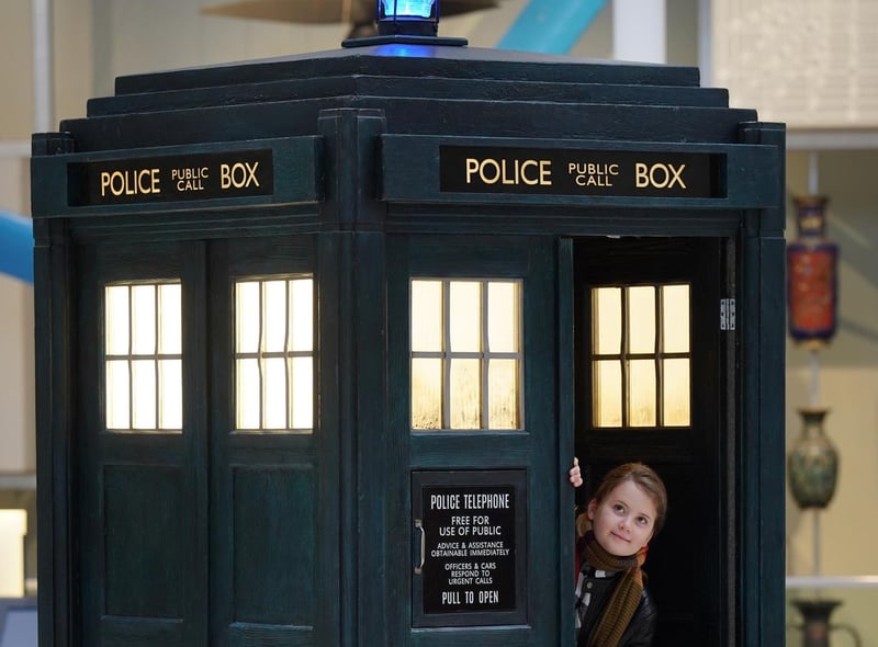 The Tardis arrives in the Grand Gallery at the National Museum of Scotland. Pictured are Oskar Madine (11) and Almila Kaplangi (12). Photo: Stewart Attwood
