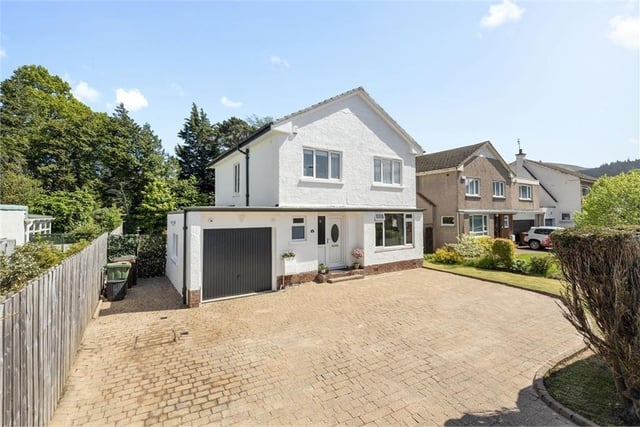 This detached house in the Colinton area in Edinburgh is currently under offer, but it has gained the attention of many house-hunters. The family home has three bedrooms, a conservatory, a garage and a spacious garden. The property is being sold for offers over £589,000.