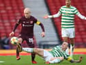 Hearts captain Steven Naismith with his Celtic counterpart Scott Brown.