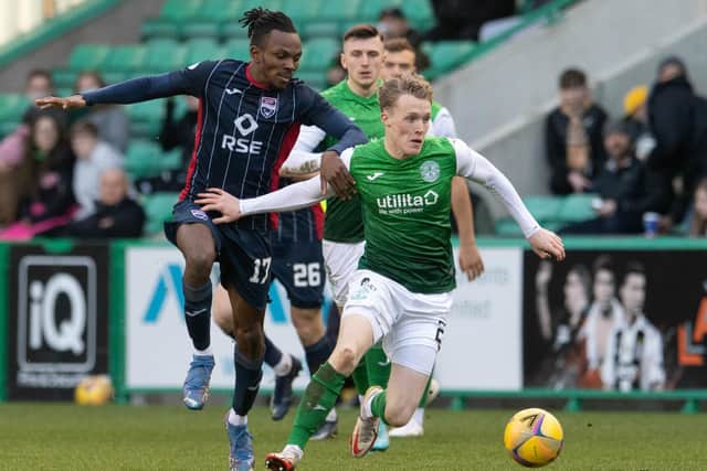 Jake Doyle-Hayes battles with Regan Charles-Cook for possession during Hibs' 2-0 win over Ross County. Picture: SNS