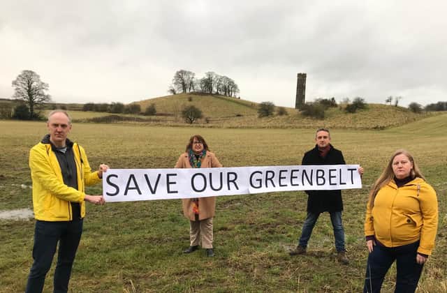 Kevin Lang and colleagues protesting over plans to build on greenbelt land at Cammo