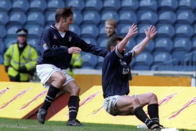 Kevin McAllister (right) celebrates after equalising for Falkirk.