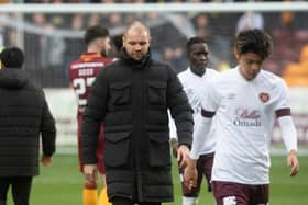 Hearts manager Robbie Neilson looks dejected at full-time at Fir Park.