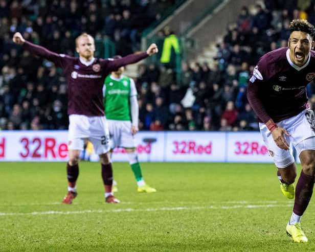 Sean Clare, right, scoring from the penalty spot at Easter Road in one of his final games for Hearts in March 2020. Picture: SNS