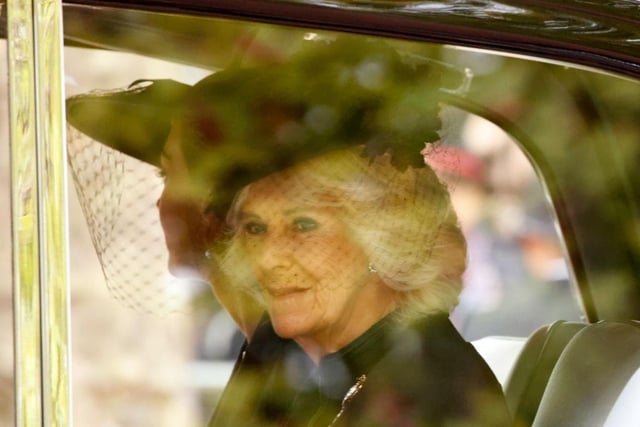 Camilla, the Queen Consort, sits in a car heading towards Westminster Abbey