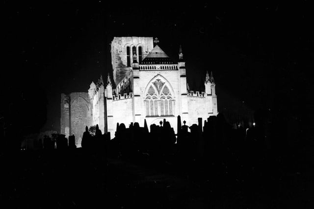 Haddington's St Mary's Abbey Church floodlit for the 'Blessing of the Plough' service in November 1962.
