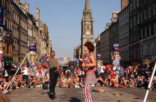Street artists perform during the Fringe Festival on the Royal Mile (Picture: Ian Stewart/AFP via Getty Images)