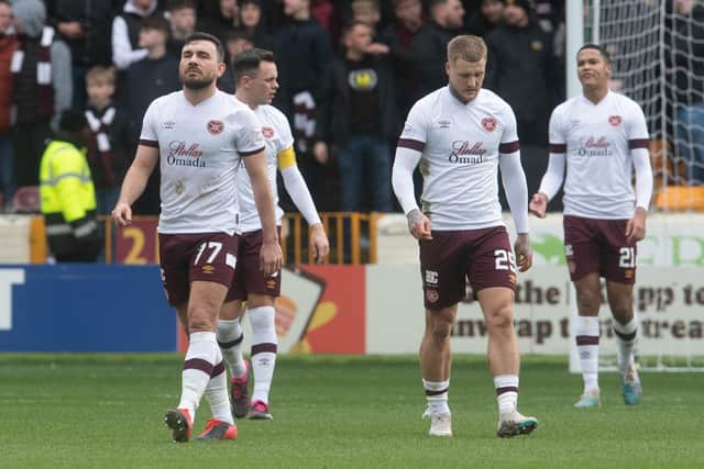 Hearts players look dejected after Motherwell go 1-0 up at Fir Park.