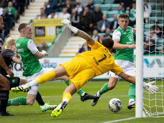 Josh Campbell scrambles in the equaliser for Hibs against Groningen. Picture: Ross Parker / SNS Group