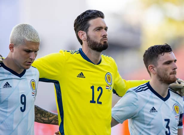 Craig Gordon lines up alongside Lyndon Dykes and Andrew Robertson for the national anthems before Scotland's 2-2 friendly draw with the Netherlands in Wednesday and could be doing so again when the nation embark on their first finals for 23 years in little over a week. (Photo by Craig Williamson / SNS Group)