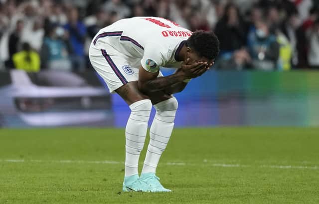 Marcus Rashford of England reacts after missing their team's third penalty in the UEFA Euro 2020 Championship Final