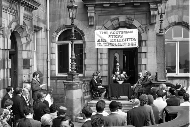 The Scotsman editor Alistair Dunnett opens the Steps art exhibition at North Bridge during the Edinburgh Festival in August 1970.