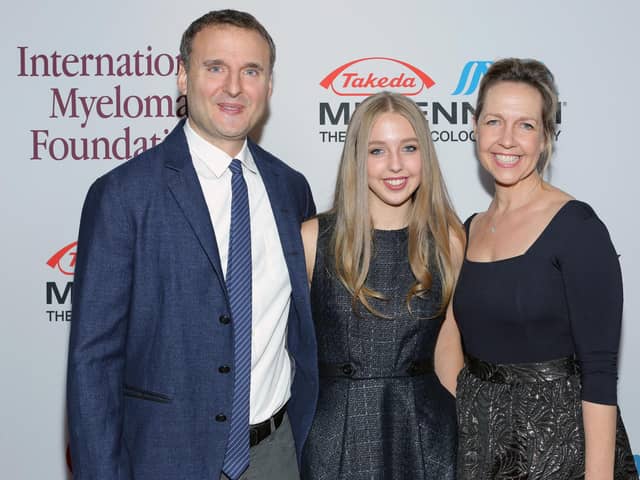 IMF Honorary Committee members Phil Rosenthal (L) and Monica Rosenthal (R) and Lily Rosenthal attend the International Myeloma Foundation's 7th Annual Comedy Celebration Benefiting The Peter Boyle Research Fund hosted by Ray Romano at The Wilshire Ebell Theatre on November 9, 2013 in Los Angeles, California.  (Photo by Mike Windle/Getty Images for IMF)