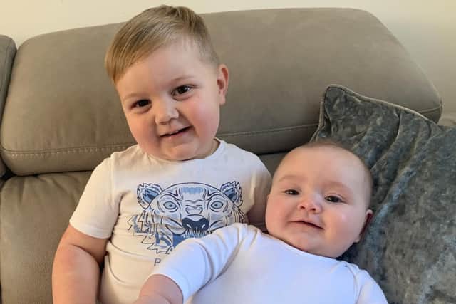 Three-year-old Cole with his new sister Nova at their home in Corstorphine.