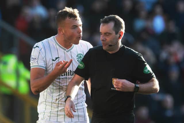 Hibs defender Ryan Porteous being sent off by referee Alan Muir against Aberdeen at Pittodrie.