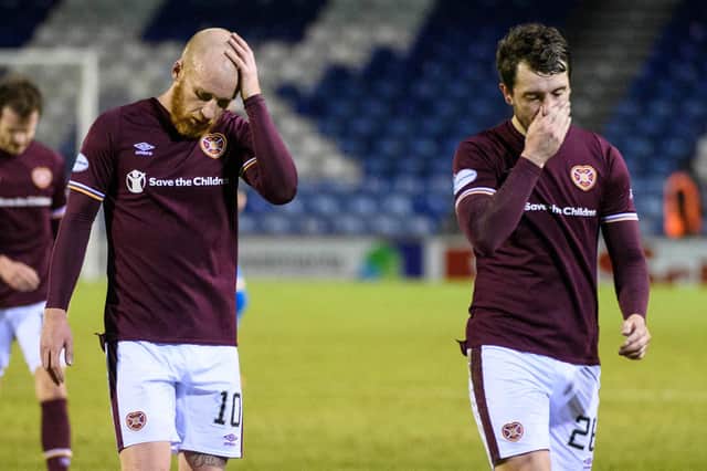 Liam Boyce and Craig Halkett walk off the park at full-time following Hearts 1-1 draw with Inverness last week. Picture: SNS