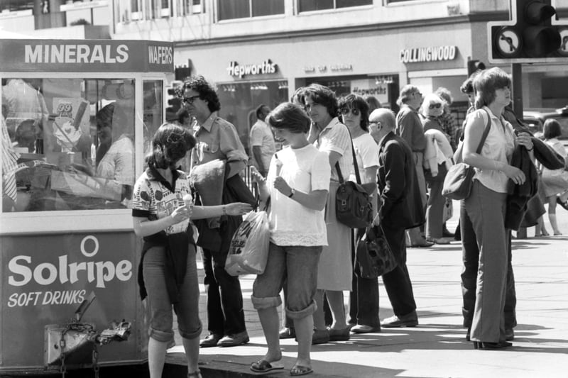 The ice cream kiosk does a roaring trade in Princes Street in June 1979.