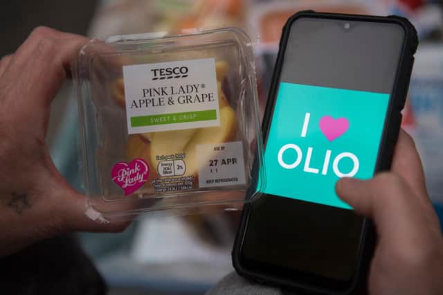 Produce from a Tesco Express being uploaded and donated to Olio. Picture by Ben Stevens / Parsons Media