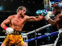 YouTube personality Logan Paul throws a left at former world welterweight king Floyd Mayweather in an eight-round exhibition bout at Hard Rock Stadium in Miami. Picture: CHANDAN KHANNA/AFP via Getty Images