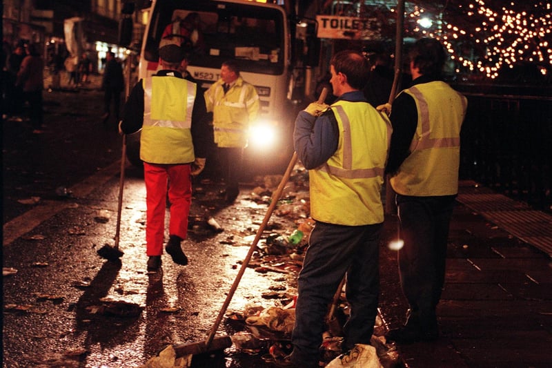 Council workers on Princes Street faced a huge task following Edinburgh's Millennium Hogmanay street party.