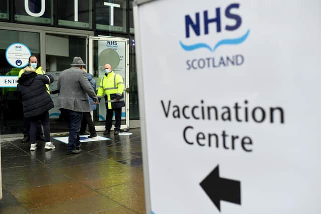 Members of the over 70s arrive at the EICC to receive their first dose of coronavirus vaccination on February 1, 2021 in Edinburgh.