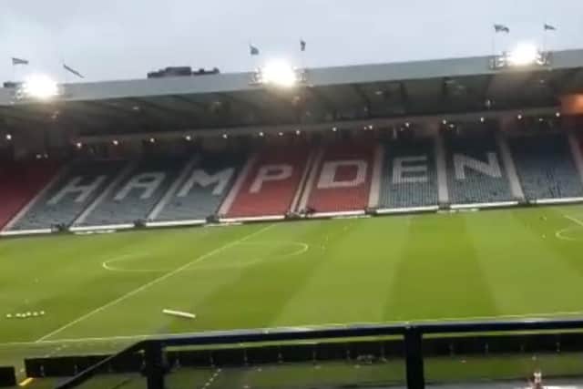 Video footage, captured an hour before the Hearts v Hibs game kicks off, shows an eerily empty Hampden Park.