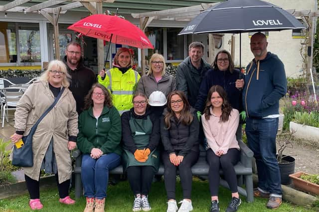 The volunteers are pictured at the Mayfield Pavilion garden.