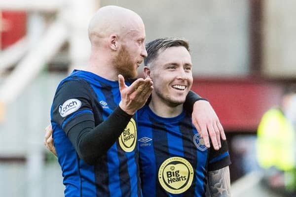 EDINBURGH, SCOTLAND - MARCH 19: Hearts' Liam Boyce (L) and Barrie McKay at full-time during a cinch Premiership match between Heart of Midlothian and Livingston at Tynecastle Stadium, on March 19, 2022, in Edinburgh, Scotland. (Photo by Ross Parker / SNS Group)