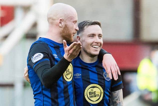EDINBURGH, SCOTLAND - MARCH 19: Hearts' Liam Boyce (L) and Barrie McKay at full-time during a cinch Premiership match between Heart of Midlothian and Livingston at Tynecastle Stadium, on March 19, 2022, in Edinburgh, Scotland. (Photo by Ross Parker / SNS Group)
