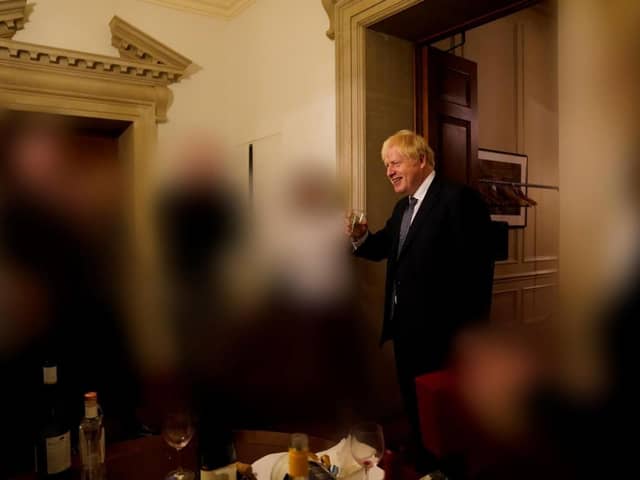 Boris Johnson raises a glass at a 'party' in 10 Downing Street during the Covid lockdown (Picture: Handout/UK Government via Getty Images)