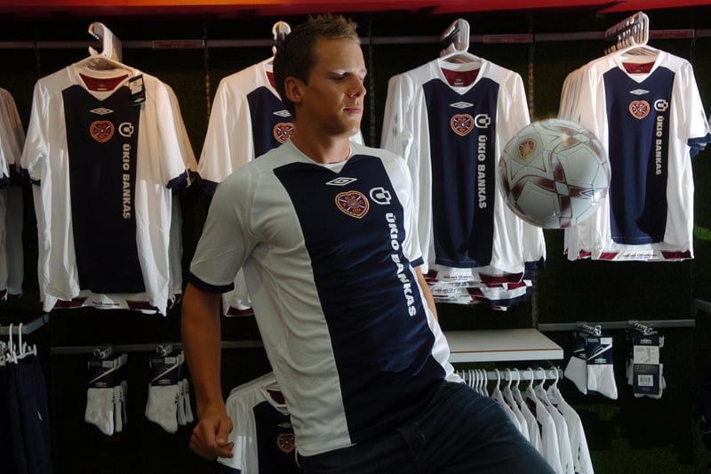 Club captain Christophe Berra wearing this smart navy blue and white Hearts away kit in the Hearts Superstore at Tynecastle. Photo by Dan Philips.